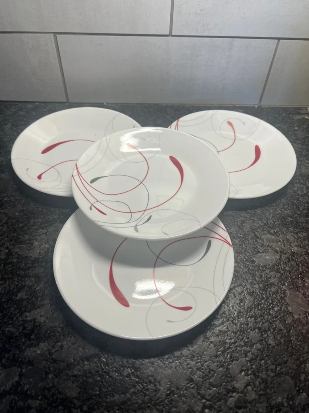 Set of 4 Vintage Corelle 7”salad Plates with Red and Gray Swirl Accent. Like new